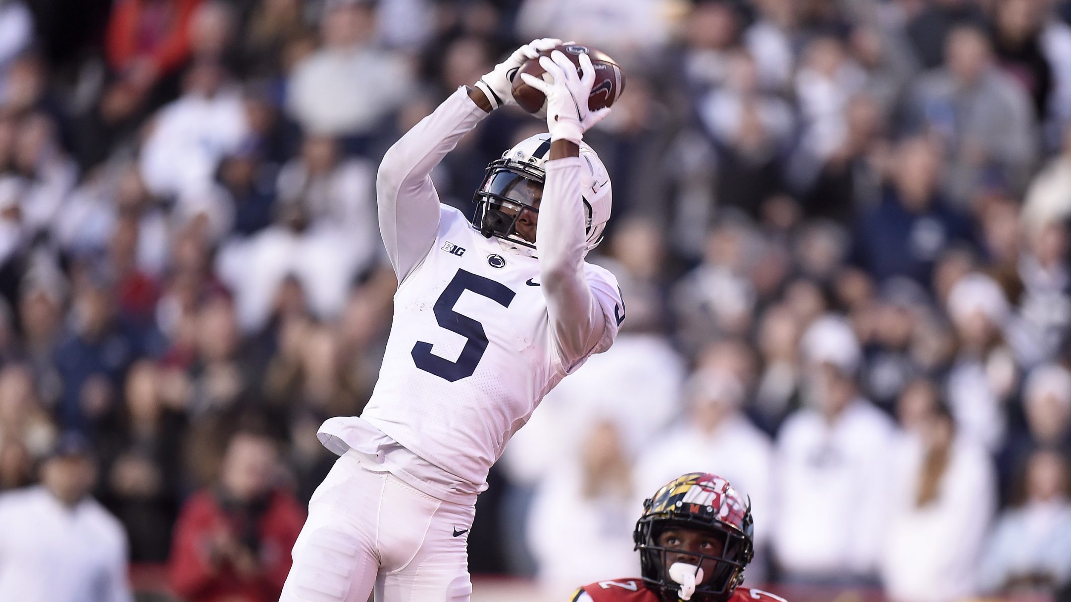 Jahan Dotson #5 of the Penn State Nittany Lions scores a touchdown in the third quarter against Jak...