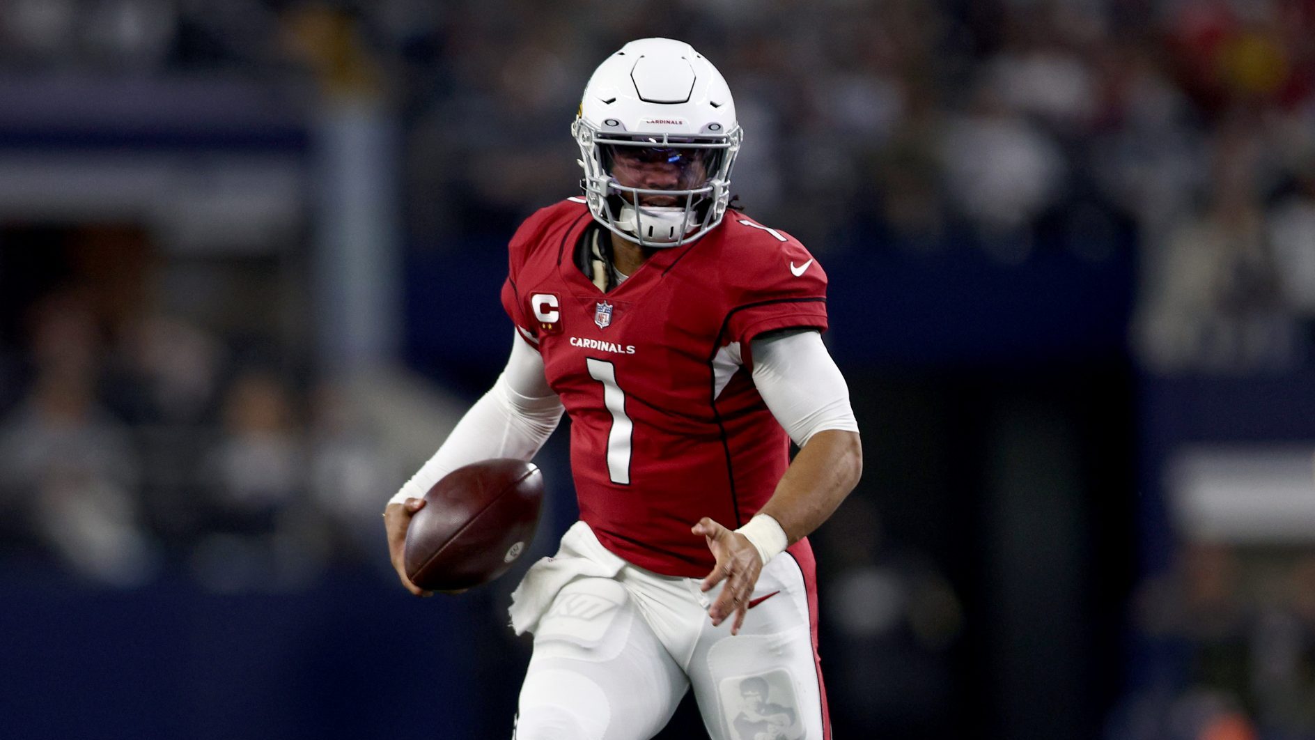 Kyler Murray #1 of the Arizona Cardinals carries the ball during the third quarter against the Dall...