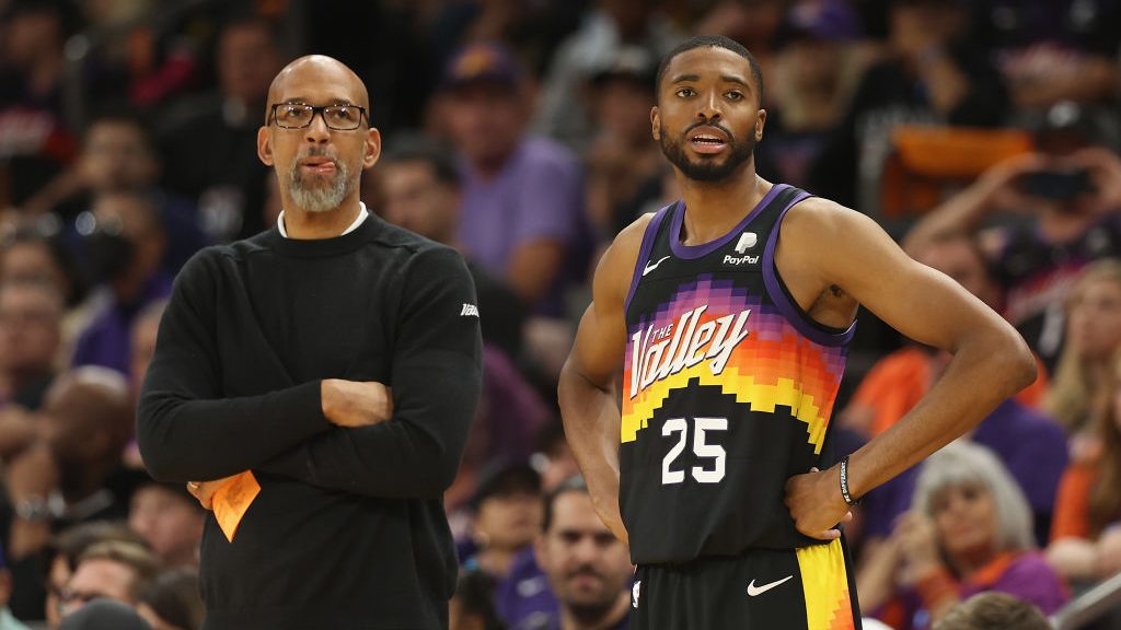 Head coach Monty Williams and Mikal Bridges #25 of the Phoenix Suns look on during the second half ...