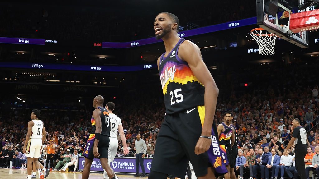 Mikal Bridges #25 of the Phoenix Suns reacts after scoring against the New Orleans Pelicans during ...