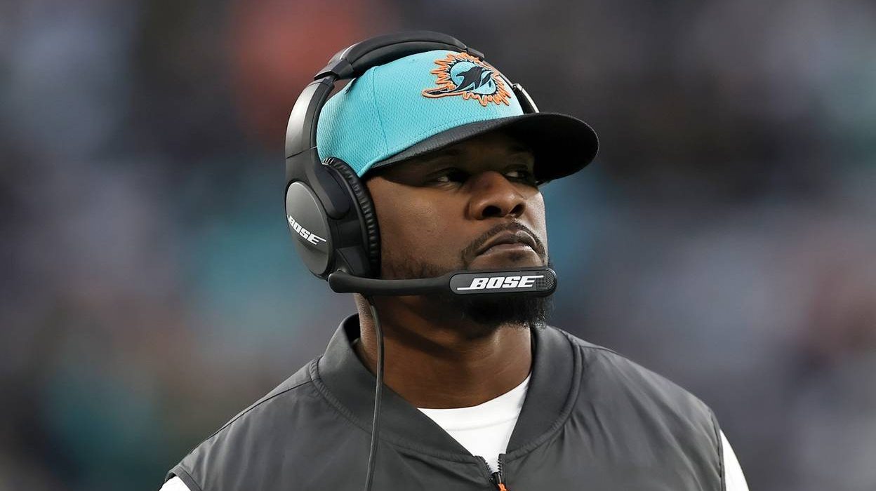 Miami Dolphins head coach Brian Flores stands on the sidelines during an NFL football game against ...