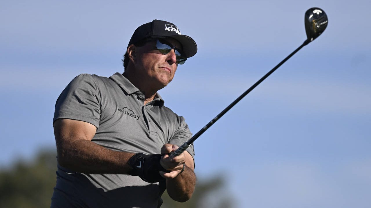 Phil Mickelson hits his tee shot on the fifth hole of the South Course at Torrey Pines during the f...