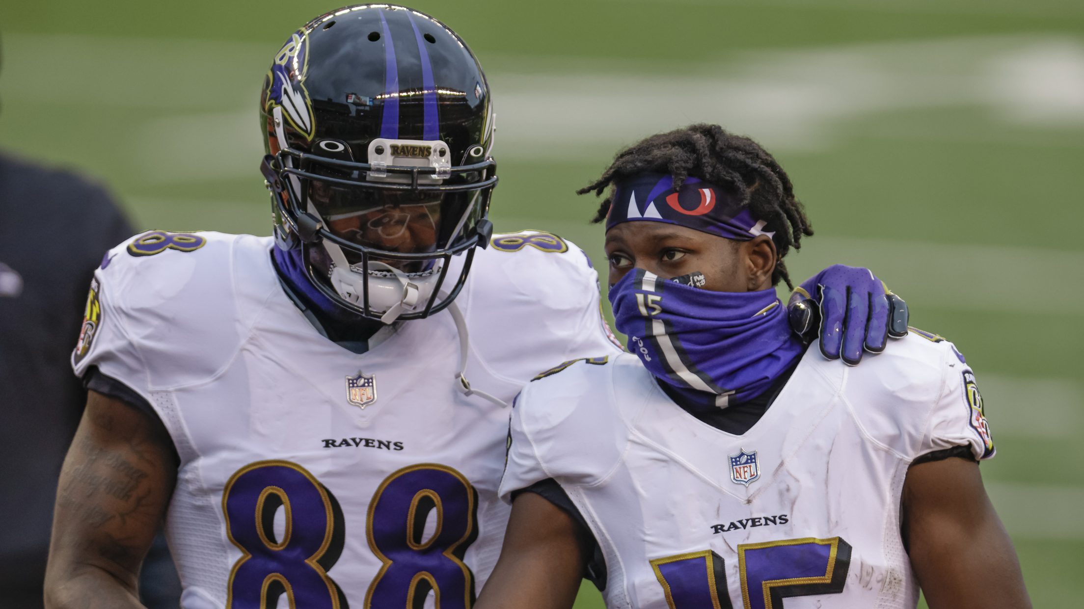 Dez Bryant #88 and Marquise Brown #15 of the Baltimore Ravens are seen after the game against the C...