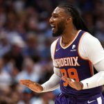 Jae Crowder #99 of the Phoenix Suns reacts toward the Mavericks bench after scoring with a three point shot during the second half of Game Three of the 2022 NBA Playoffs Western Conference Semifinals at American Airlines Center on May 6, 2022 in Dallas, Texas. (Photo by Ron Jenkins/Getty Images)