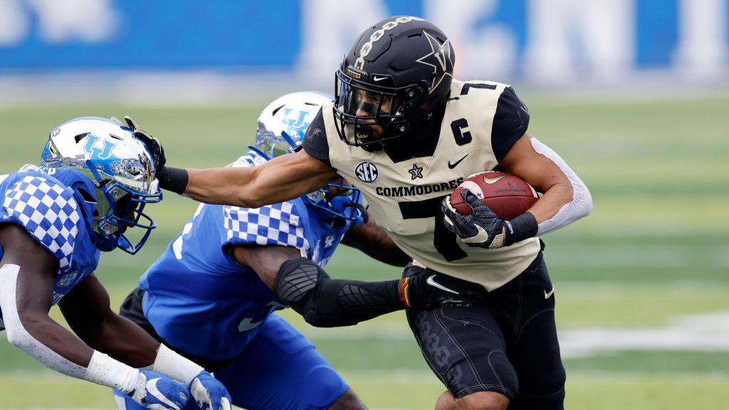 Cam Johnson #7 of the Vanderbilt Commodores runs after a reception against the Kentucky Wildcats in...
