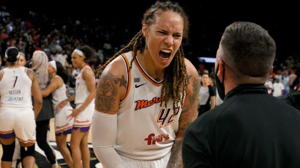 Brittney Griner #42 of the Phoenix Mercury celebrates with Mercury President Vince Kozar after the ...