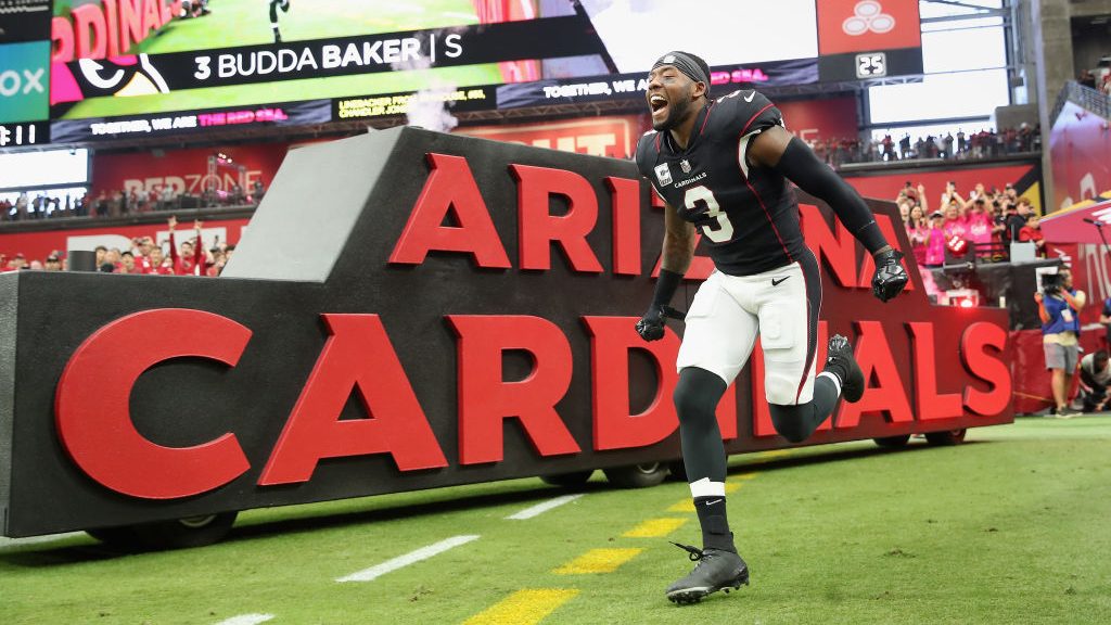 Safety Budda Baker #3 of the Arizona Cardinals runs onto the field before the NFL game at State Far...
