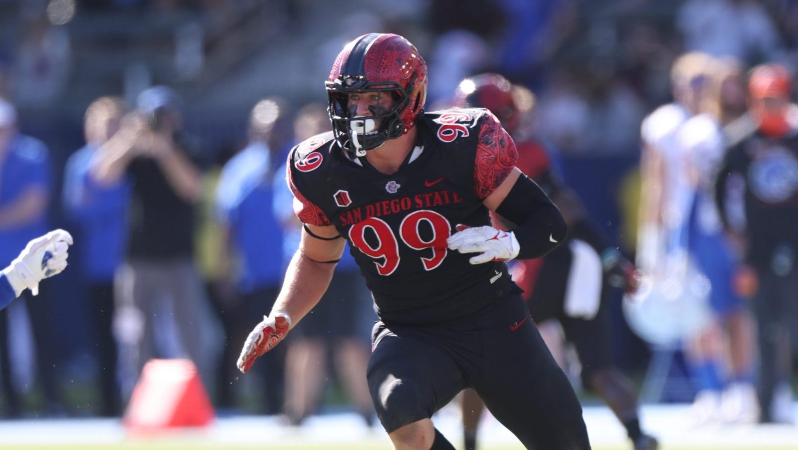 Cameron Thomas #99 of the San Diego State Aztecs rushes against the Boise State Broncos on November...