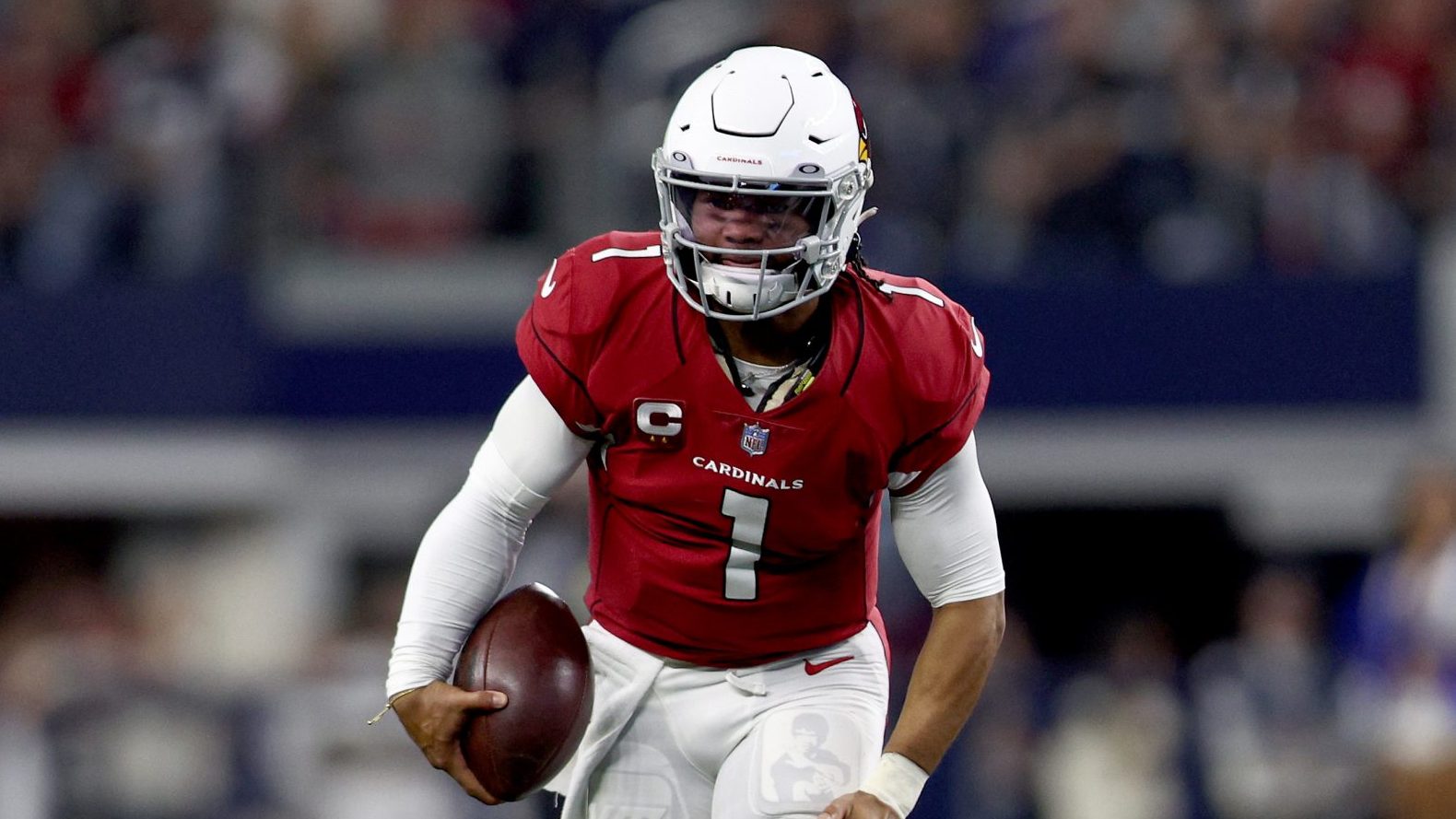 Kyler Murray #1 of the Arizona Cardinals carries the ball during the third quarter against the Dall...
