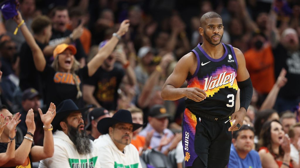 Chris Paul #3 of the Phoenix Suns reacts after hitting a three-point shot against the Dallas Maveri...