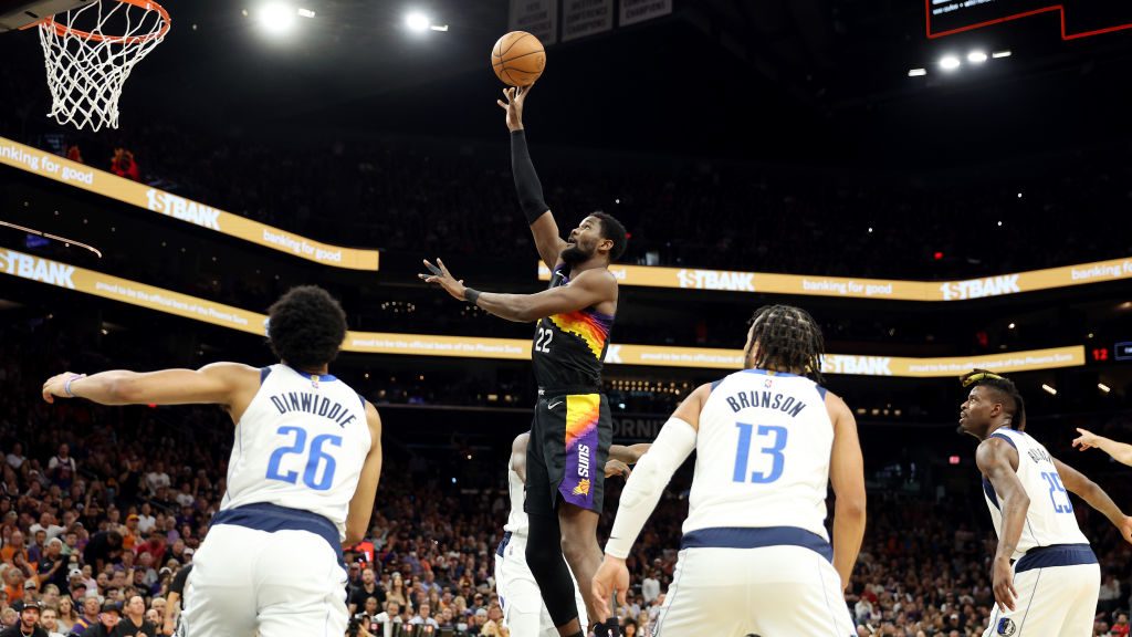 Deandre Ayton #22 of the Phoenix Suns shoots the ball during the first half against the Dallas Mave...