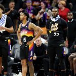 Cameron Payne #15 and Jae Crowder #99 of the Phoenix Suns react during the fourth quarter against the Dallas Mavericks in Game Seven of the 2022 NBA Playoffs Western Conference Semifinals at Footprint Center on May 15, 2022 in Phoenix, Arizona. (Photo by Christian Petersen/Getty Images)