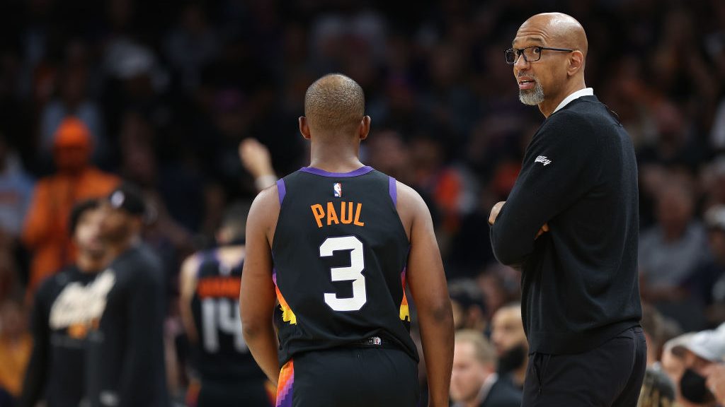 Head coach Monty Williams of the Phoenix Suns looks up as Chris Paul #3 checks out during the secon...