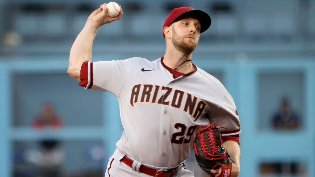 Merrill Kelly #29 of the Arizona Diamondbacks pitches during the first inning in game two of a doub...