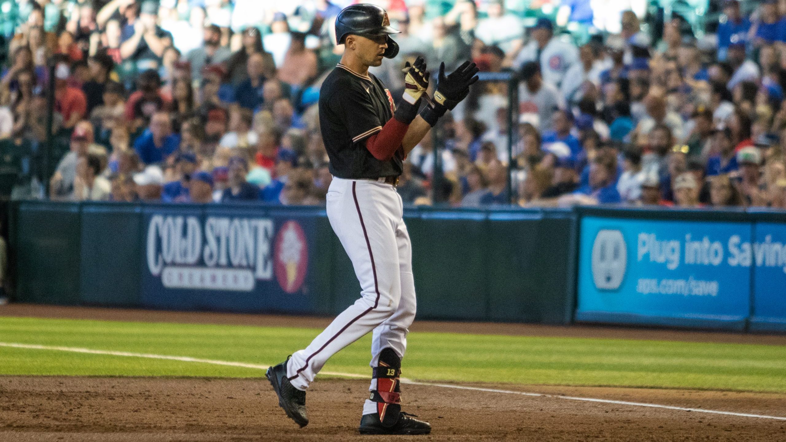 Arizona Diamondbacks shortstop Nick Ahmed claps after an RBI single against the Chicago Cubs at Cha...