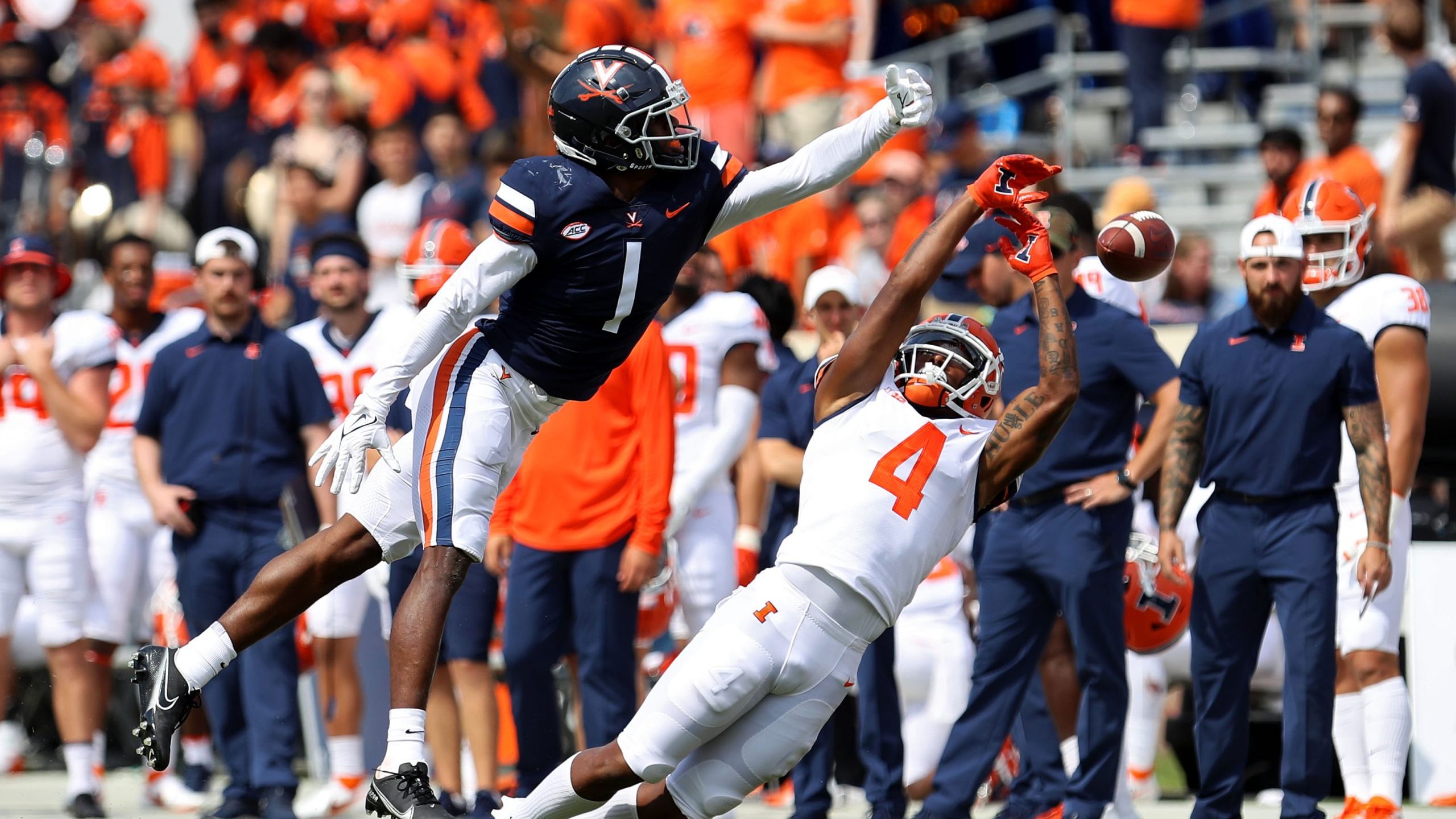 CHARLOTTESVILLE, VA - SEPTEMBER 11: Nick Grant #1 of the Virginia Cavaliers defends a pass intended...