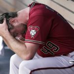 Arizona Diamondbacks starter Tyler Gilbert sits in the dugout after being pulled against the Los Angeles Dodgers during the sixth inning of a baseball game Tuesday, May 17, 2022, in Los Angeles. (AP Photo/Marcio Jose Sanchez)
