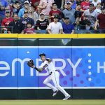 Arizona Diamondbacks left fielder David Peralta makes a catch on a fly ball hit by Atlanta Braves' Dansby Swanson during the first inning of a baseball game Tuesday, May 31, 2022, in Phoenix. (AP Photo/Ross D. Franklin)
