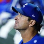 Kansas City Royals manager Mike Matheny watches the action on the field from the dugout during the eighth inning of a baseball game against the Arizona Diamondbacks Monday, May 23, 2022, in Phoenix. The Diamondbacks won 9-5. (AP Photo/Ross D. Franklin)