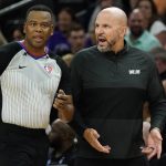 Dallas Mavericks head coach Jason Kidd, right, argues with referee Sean Wright, left, during the second half of Game 5 of an NBA basketball second-round playoff series against the Phoenix Suns Tuesday, May 10, 2022, in Phoenix. The Suns won 110-80. (AP Photo/Ross D. Franklin)