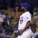 Los Angeles Dodgers relief pitcher Hanser Alberto, who normally plays in the infield, gestures after the Dodgers defeated the Arizona Diamondbacks 12-3 in a baseball game against the Arizona Diamondbacks Tuesday, May 17, 2022, in Los Angeles. (AP Photo/Mark J. Terrill)
