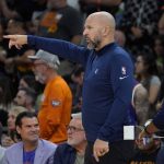 Dallas Mavericks head coach Jason Kidd directs his players during the second half of Game 2 of an NBA basketball second-round playoff series against the Phoenix Suns, Wednesday, May 4, 2022, in Phoenix. (AP Photo/Matt York)