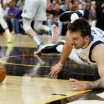 Dallas Mavericks guard Luka Doncic loses the ball against the Phoenix Suns during the second half of Game 5 of an NBA basketball second-round playoff series Tuesday, May 10, 2022, in Phoenix. The Suns won 110-80. (AP Photo/Ross D. Franklin)
