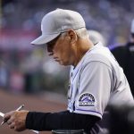 
              Colorado Rockies manager Bud Black studies his lineup card in the second inning of a baseball game against the Arizona Diamondbacks, Sunday, May 8, 2022, in Phoenix. (AP Photo/Ross D. Franklin)
            