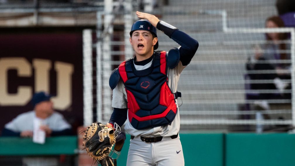 Daniel Susac (6) Arizona Wildcats Catcher gives a sign to the infield during a baseball game betwee...