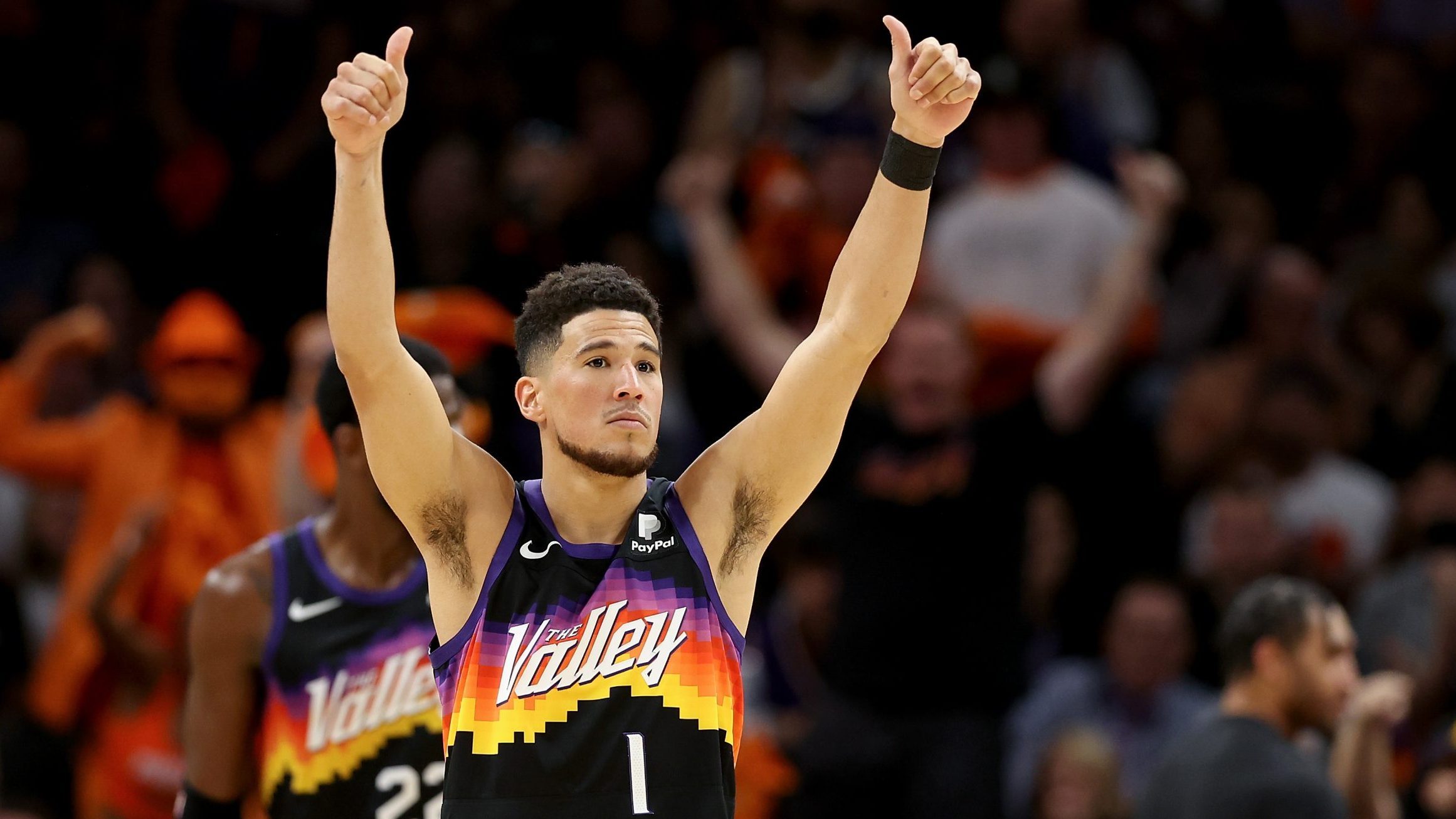 Devin Booker #1 of the Phoenix Suns reacts during the first half of Game One of the Western Confere...