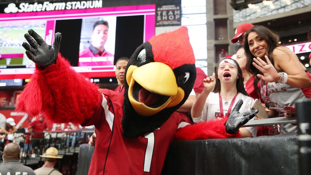Arizona Cardinals mascot Big Red poses with fans prior to their game against the Detroit Lions at S...
