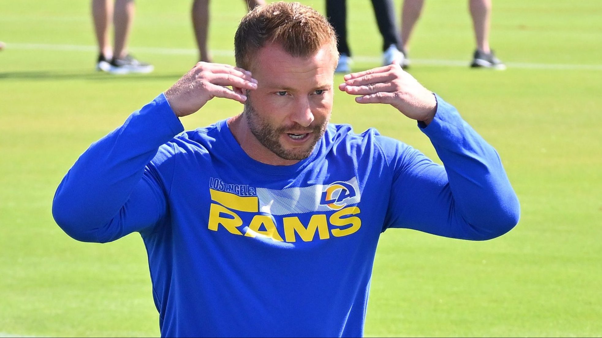 Head coach Sean McVay of the Los Angeles Rams talks with players before mini camp on June 8, 2022 a...