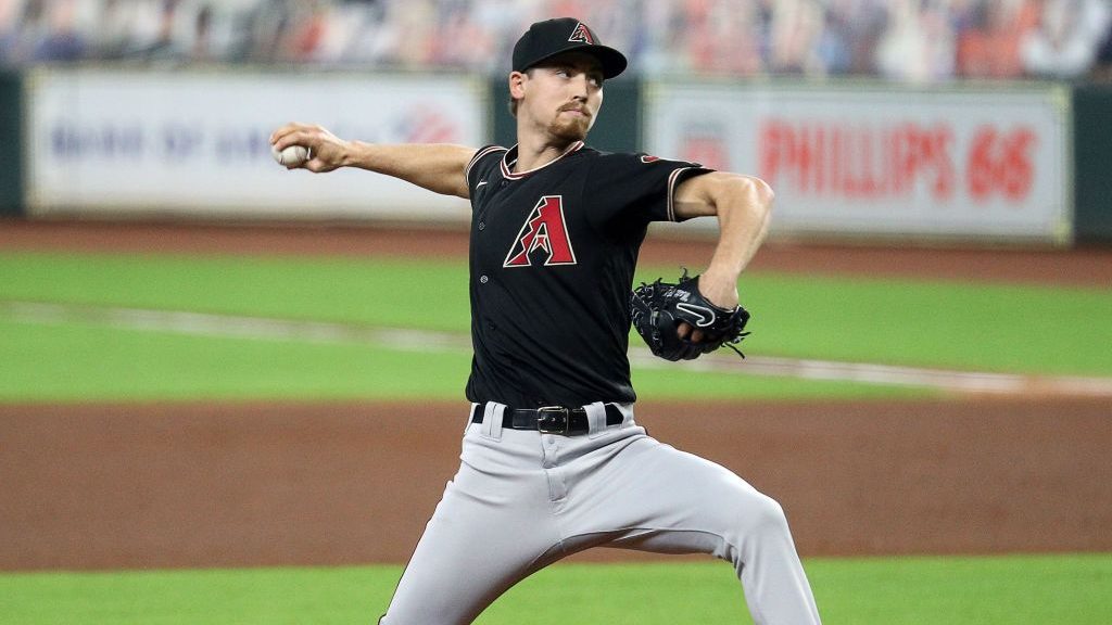 Luke Weaver #24 of the Arizona Diamondbacks pitches in the first inning against the Houston Astros ...