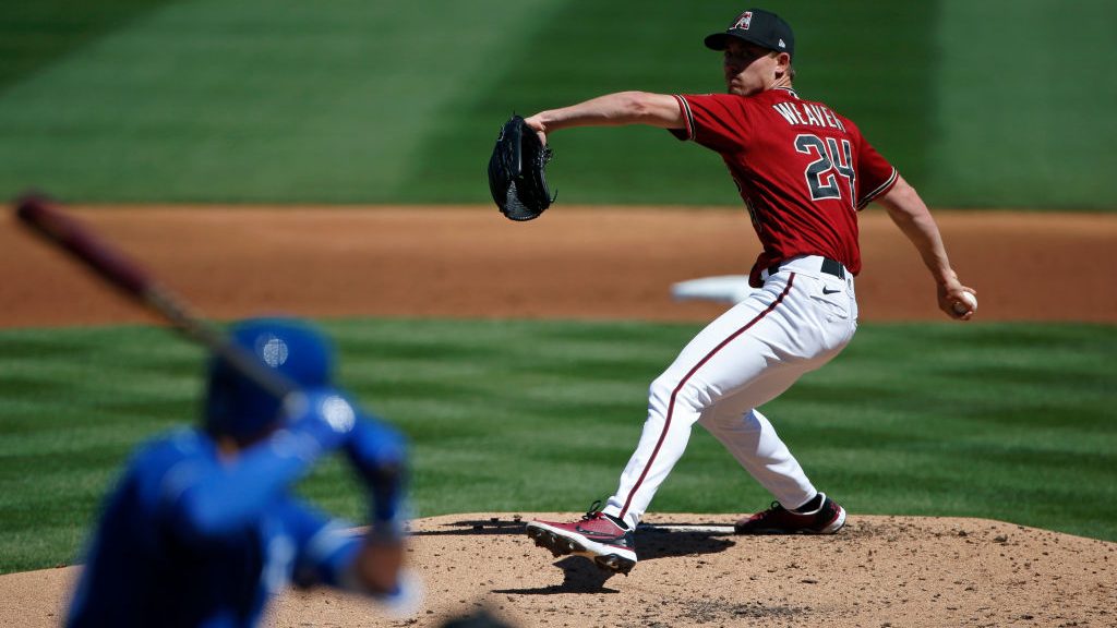 Luke Weaver #24 of the Arizona Diamondbacks delivers a pitch against the Kansas City Royals during ...
