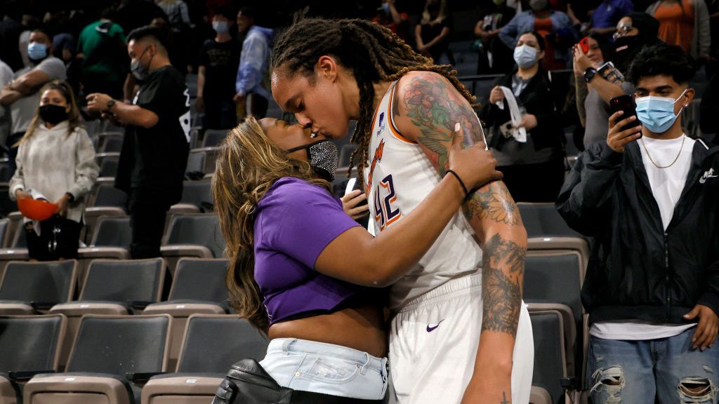 Brittney Griner #42 of the Phoenix Mercury kisses her wife Cherelle Griner in the stands after the ...