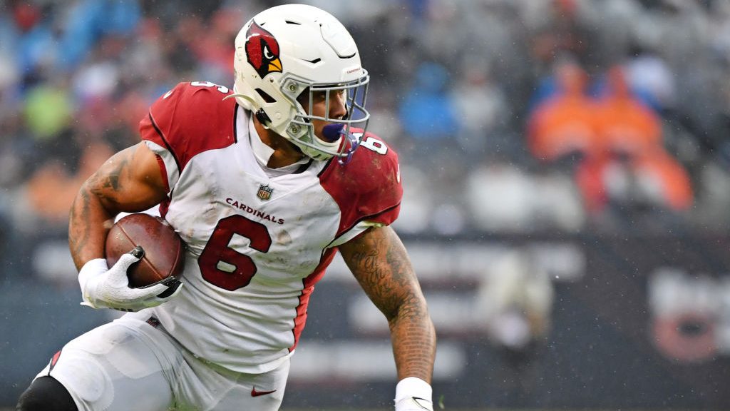 James Conner #6 of the Arizona Cardinals runs with the ball for a touchdown reception against the C...