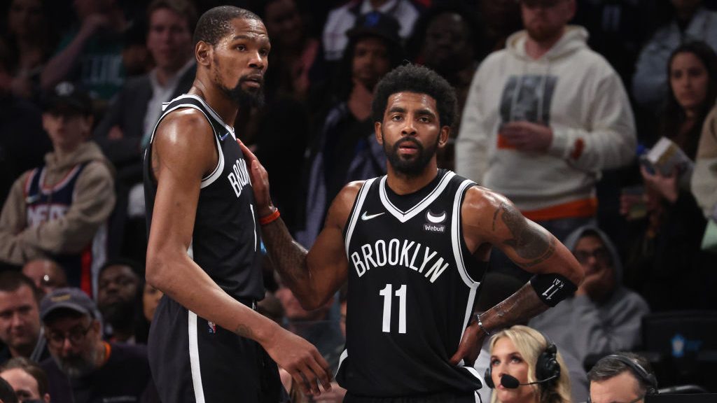 Kevin Durant #7 and Kyrie Irving #11 of the Brooklyn Nets look on in the final seconds of their 109...