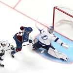 Andrei Vasilevskiy #88 of the Tampa Bay Lightning has a goal scored against him by Andre Burakovsky #95 of the Colorado Avalanche during overtime to win Game One of the 2022 Stanley Cup Final 4-3 at Ball Arena on June 15, 2022 in Denver, Colorado. (Photo by Justin Edmonds/Getty Images)
