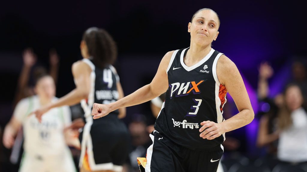 Diana Taurasi #3 of the Phoenix Mercury reacts after scoring against the Minnesota Lynx during the ...