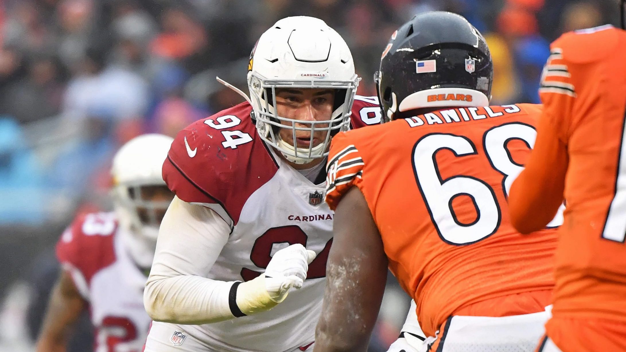 Zach Allen #94 of the Arizona Cardinals chases after the ballcarrier against the Chicago Bears at S...