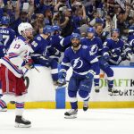 The Tampa Bay Lightning bench celebrates after defeating the New York Rangers during Game 6 of the NHL hockey Stanley Cup playoffs Eastern Conference finals Saturday, June 11, 2022, in Tampa, Fla. (AP Photo/Chris O'Meara)