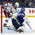 Tampa Bay Lightning goaltender Andrei Vasilevskiy (88) stops a shot by New York Rangers left wing Chris Kreider (20) during the third period in Game 6 of the NHL hockey Stanley Cup playoffs Eastern Conference finals Saturday, June 11, 2022, in Tampa, Fla. (AP Photo/Chris O'Meara)