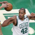Boston Celtics center Al Horford (42) reacts during the fourth quarter of Game 6 of basketball's NBA Finals against the Golden State Warriors, Thursday, June 16, 2022, in Boston. (AP Photo/Michael Dwyer)