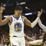 Golden State Warriors guard Jordan Poole (3) celebrates after scoring against the Boston Celtics during the second half of Game 5 of basketball's NBA Finals in San Francisco, Monday, June 13, 2022. (AP Photo/Jed Jacobsohn)