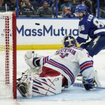New York Rangers goaltender Igor Shesterkin (31) makes the save against Tampa Bay Lightning right wing Nikita Kucherov (86) during the second period in Game 6 of the NHL hockey Stanley Cup playoffs Eastern Conference finals, Saturday, June 11, 2022, in Tampa, Fla. (AP Photo/Chris O'Meara)