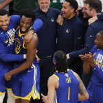 The Golden State Warriors celebrate after defeating the Boston Celtics in Game 6 to win basketball's NBA Finals, Thursday, June 16, 2022, in Boston. (AP Photo/Michael Dwyer)