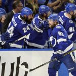 Tampa Bay Lightning center Steven Stamkos (91) celebrates with the bench after his goal against the New York Rangers during the third period in Game 6 of the NHL hockey Stanley Cup playoffs Eastern Conference finals Saturday, June 11, 2022, in Tampa, Fla. (AP Photo/Chris O'Meara)