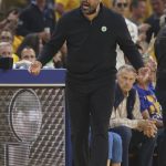 Boston Celtics head coach Ime Udoka reacts toward an official during the first half of his team's Game 5 of basketball's NBA Finals against the Golden State Warriors in San Francisco, Monday, June 13, 2022. (AP Photo/Jed Jacobsohn)