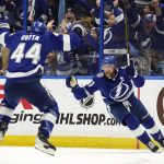Tampa Bay Lightning center Steven Stamkos (91) celebrates his goal against the New York Rangers with defenseman Jan Rutta (44) during the third period in Game 6 of the NHL hockey Stanley Cup playoffs Eastern Conference finals Saturday, June 11, 2022, in Tampa, Fla. (AP Photo/Chris O'Meara)