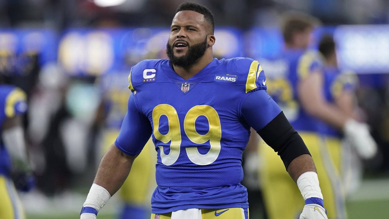 FILE - Los Angeles Rams' Aaron Donald warms up before an NFL wild-card playoff football game agains...